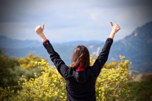 Positive Thinking photo, woman holding thumbs up